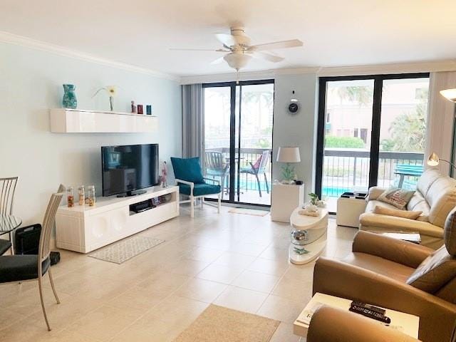 Spacious living and dining area.  Enjoy the daily parade of boats on the Intracoastal while you sit in your comfy chair.
